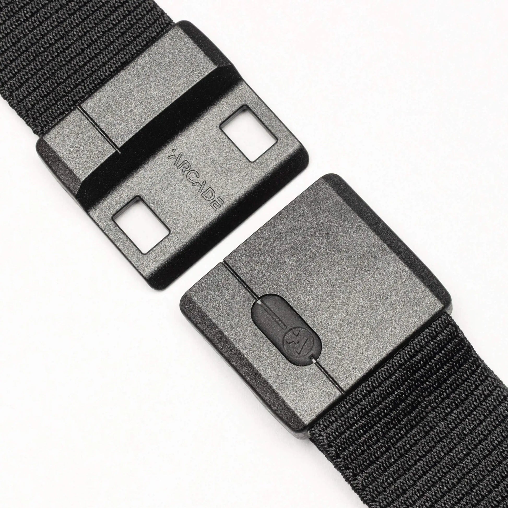 Black belt with a metallic buckle on a white background | XSports