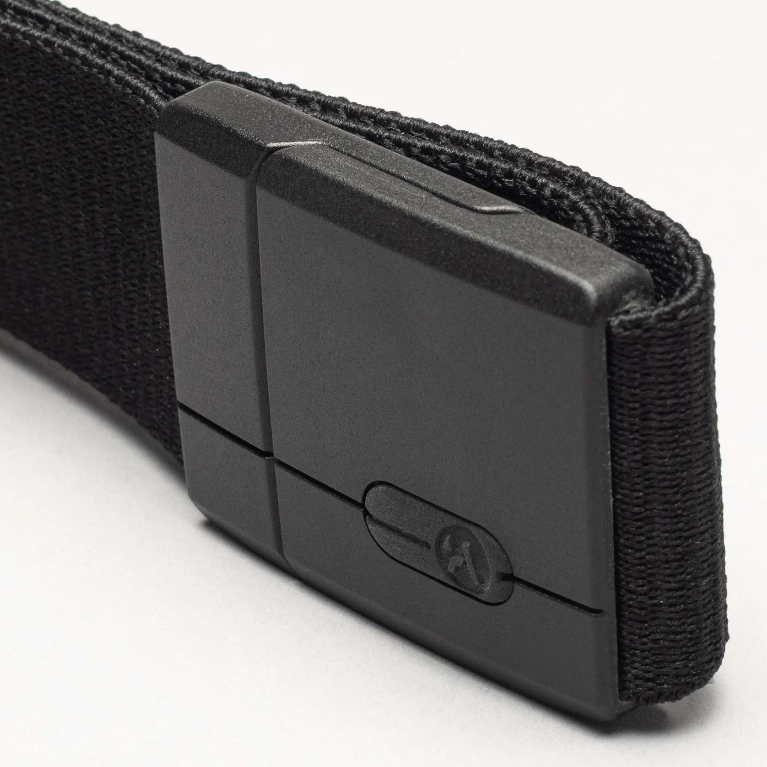 Black belt with a metallic buckle on a white background | XSports