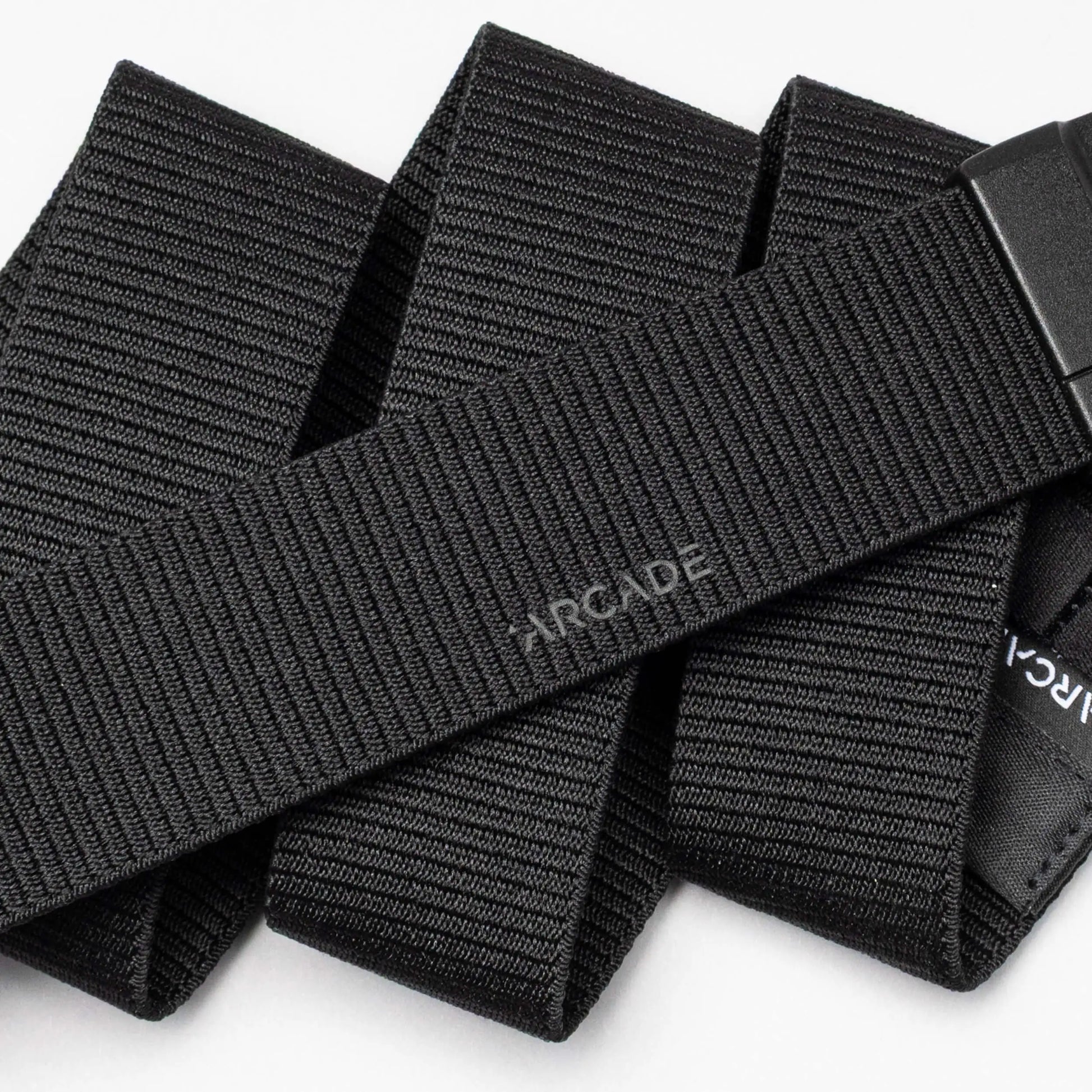 Black woven straps with 'Arcade' branding on a white background | XSports