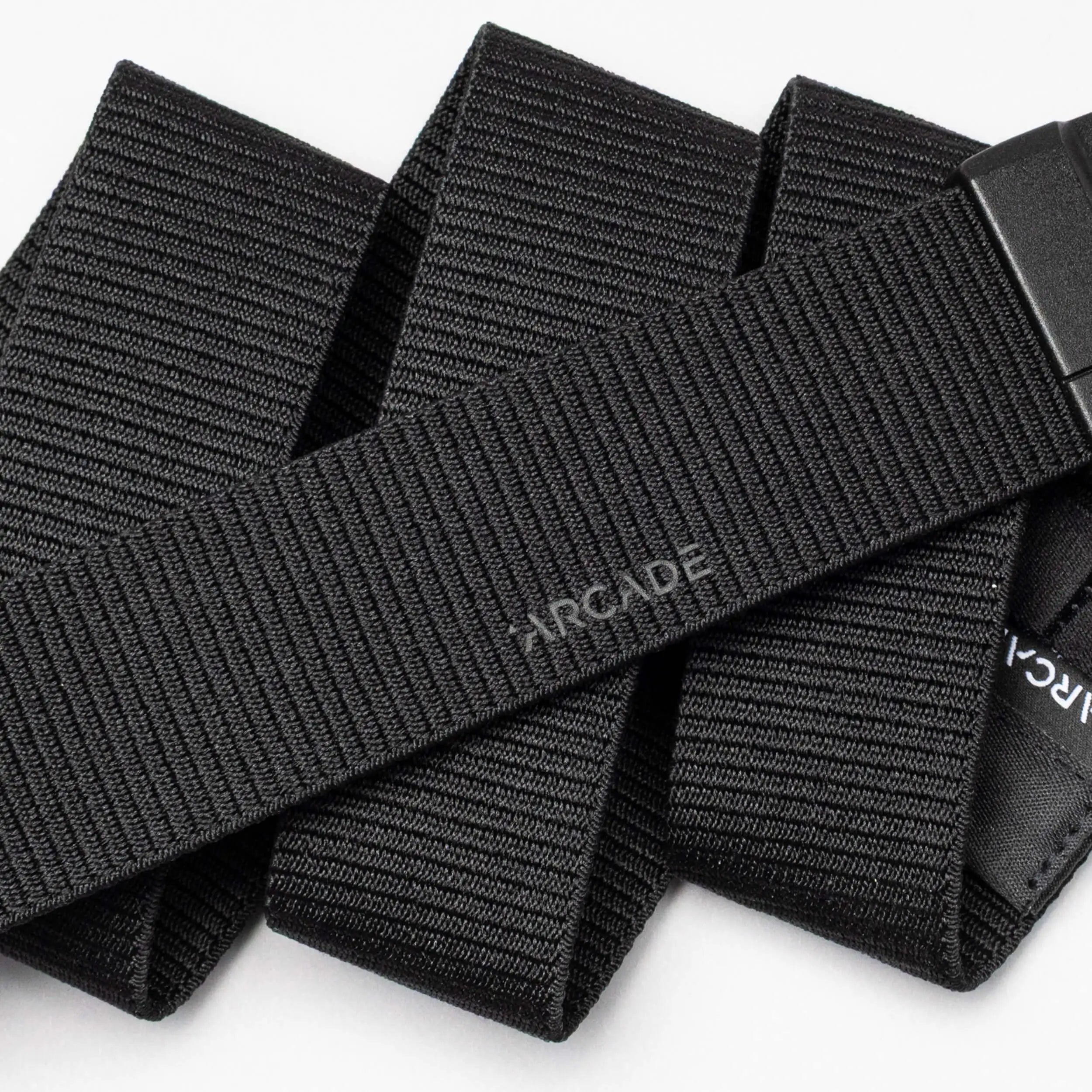 Black woven straps with 'Arcade' branding on a white background | XSports