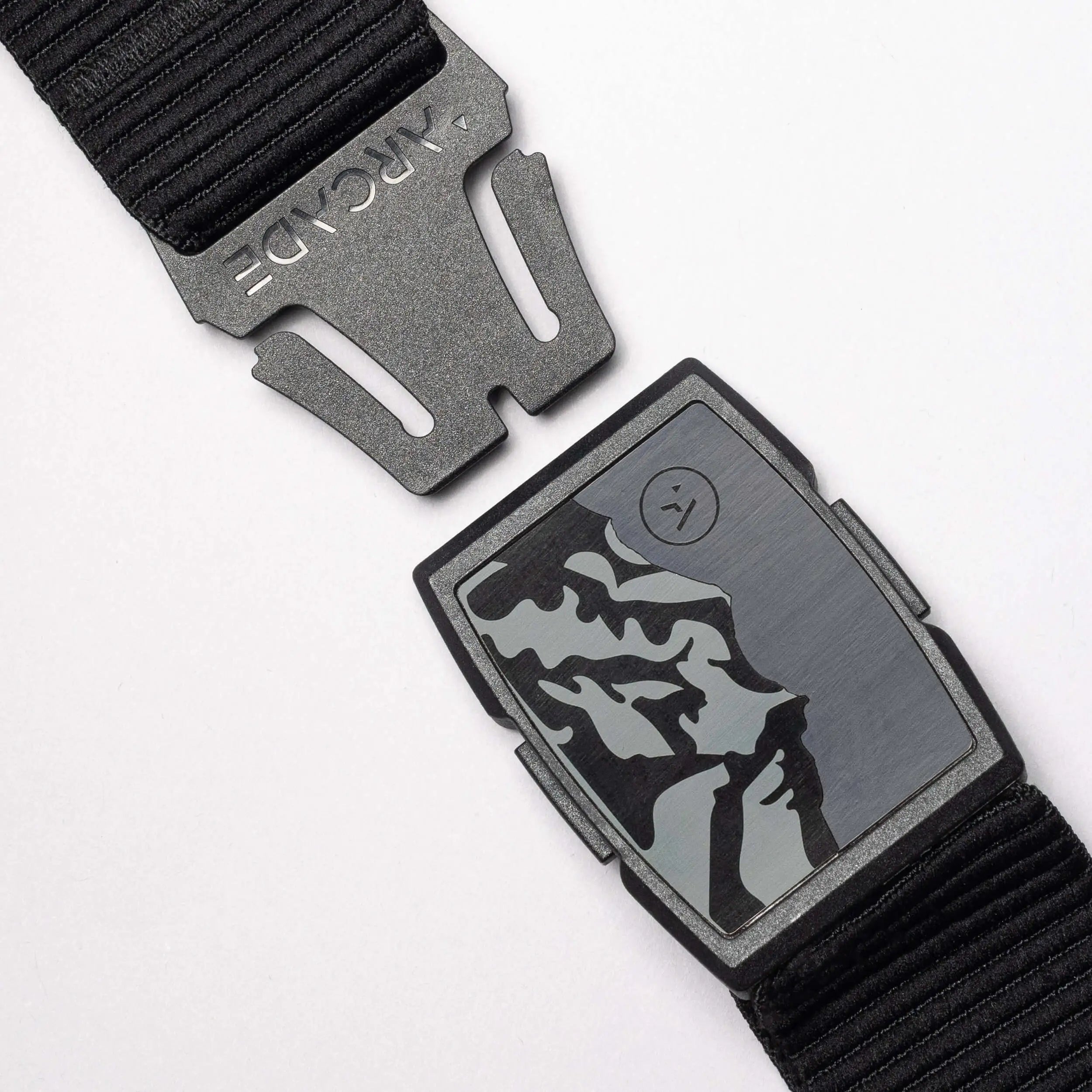 Black belt with a camouflage patterned buckle on a white background | XSports